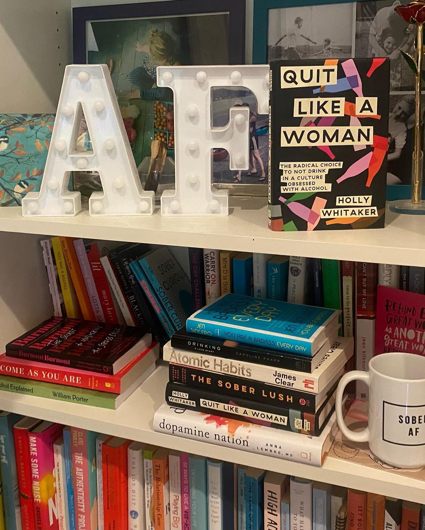 The best books for women quitting drinking and going alcohol-free from my bookshelf. Featuring Quit Like A Woman by Holly Whitaker.